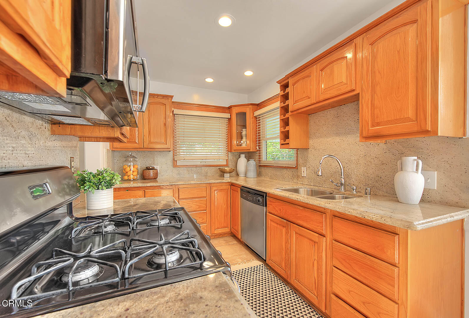 3671 Grayburn Road Pasadena, CA 91107 - Photo 16 of 50 a kitchen with sink a stove and a window