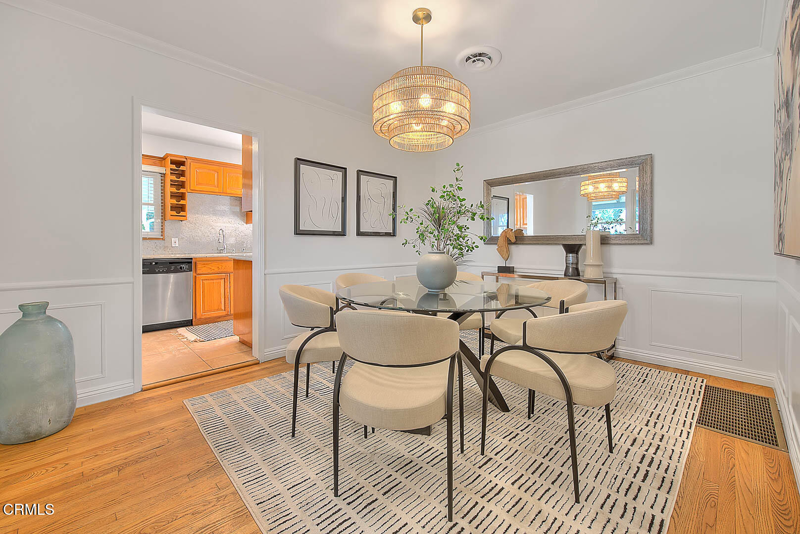3671 Grayburn Road Pasadena, CA 91107 - Photo 18 of 50 a living room with furniture a chandelier and a dining table