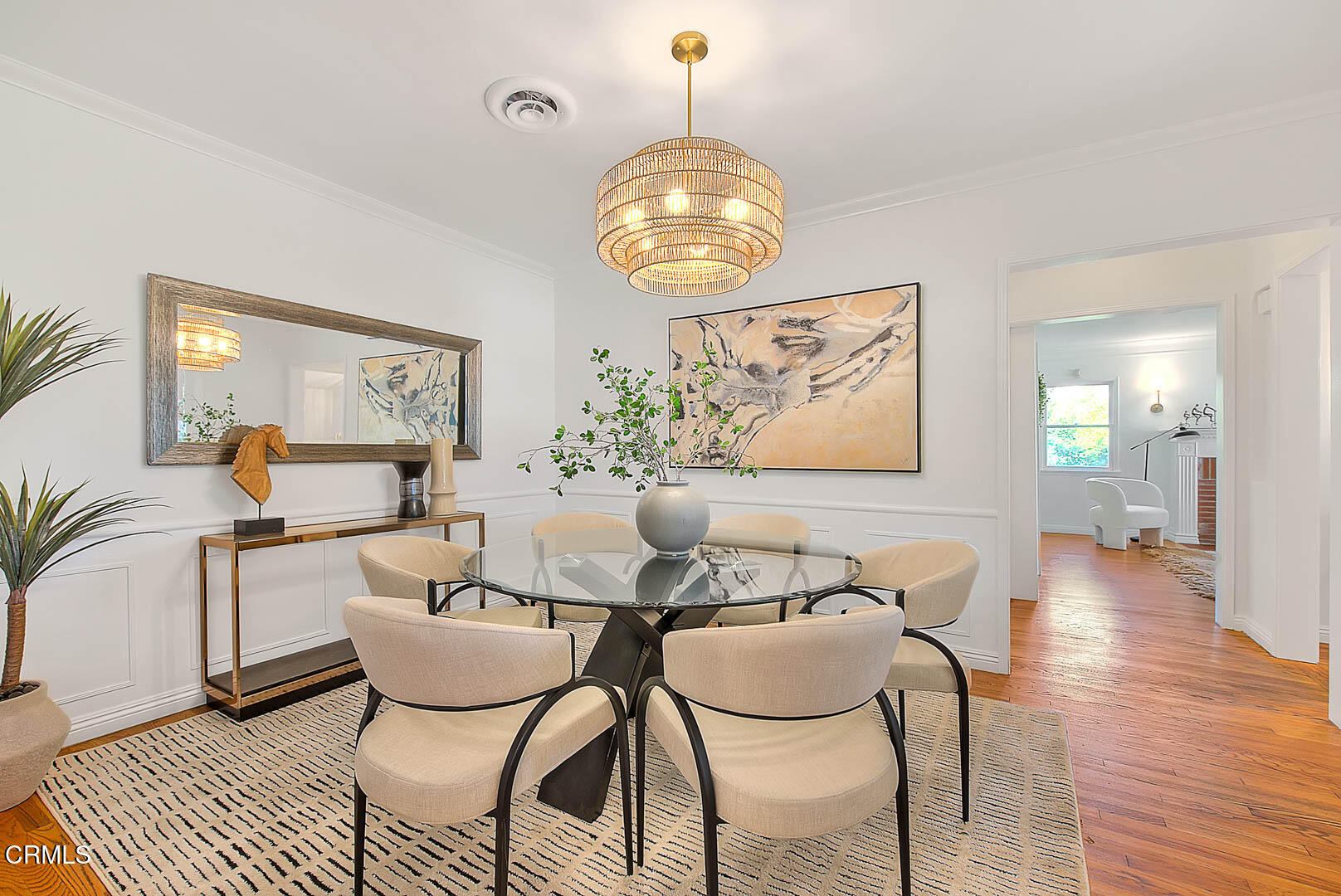 3671 Grayburn Road Pasadena, CA 91107 - Photo 20 of 50 a living room with dining table and a chandelier