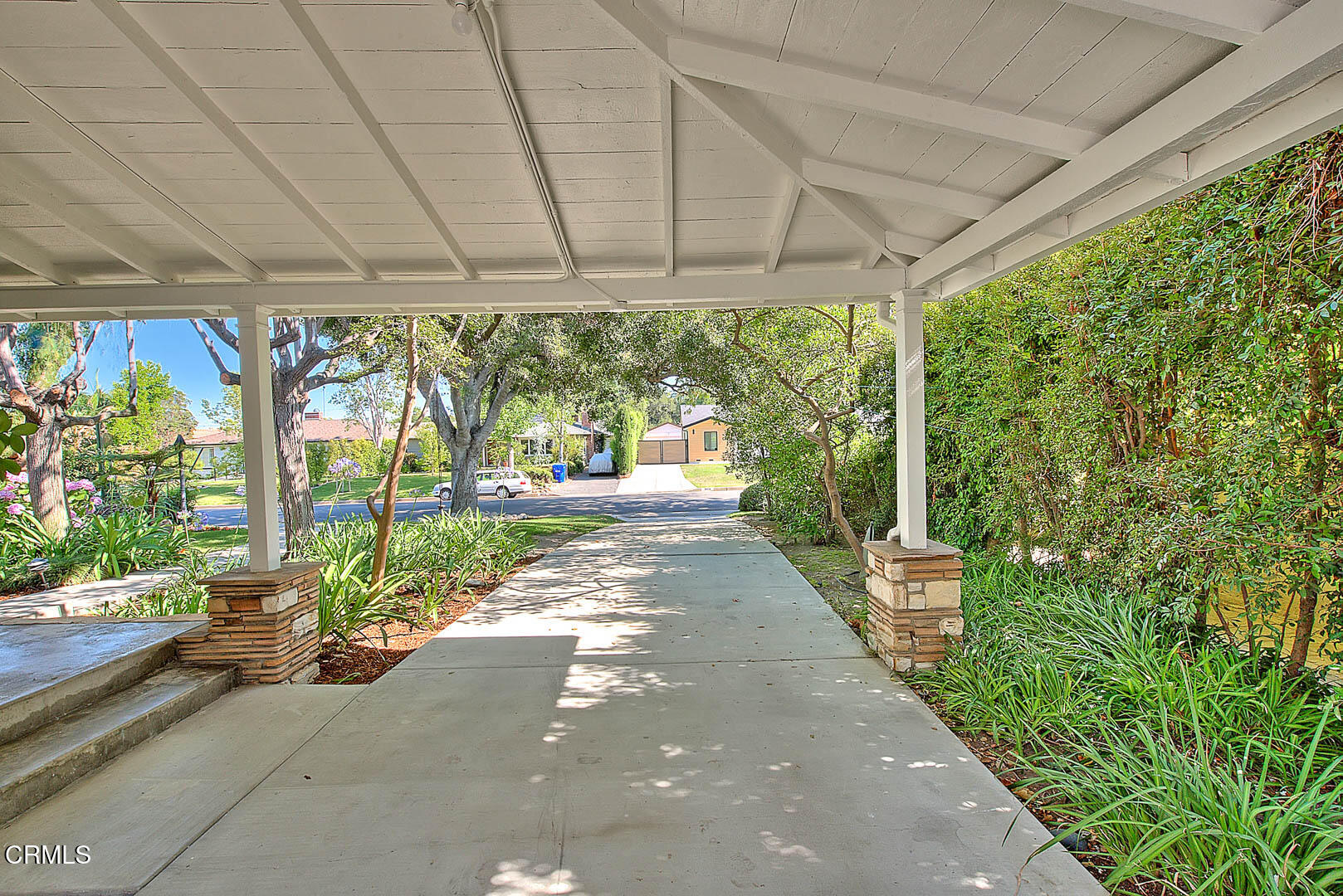 3671 Grayburn Road Pasadena, CA 91107 - Photo 2 of 50 a view of a patio with table and chairs potted plants with floor to ceiling window