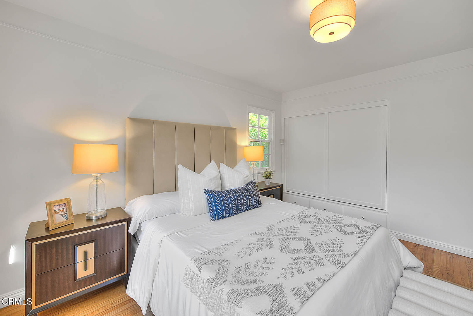 3671 Grayburn Road Pasadena, CA 91107 - Photo 22 of 50 a bedroom with a bed and lamps