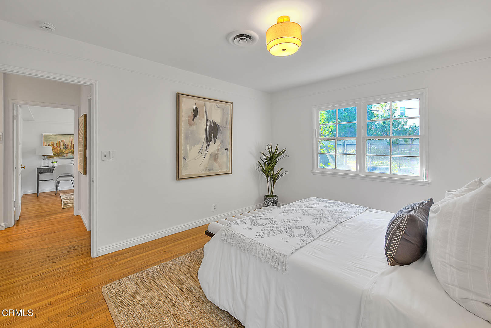 3671 Grayburn Road Pasadena, CA 91107 - Photo 24 of 50 a bedroom with a bed and a window