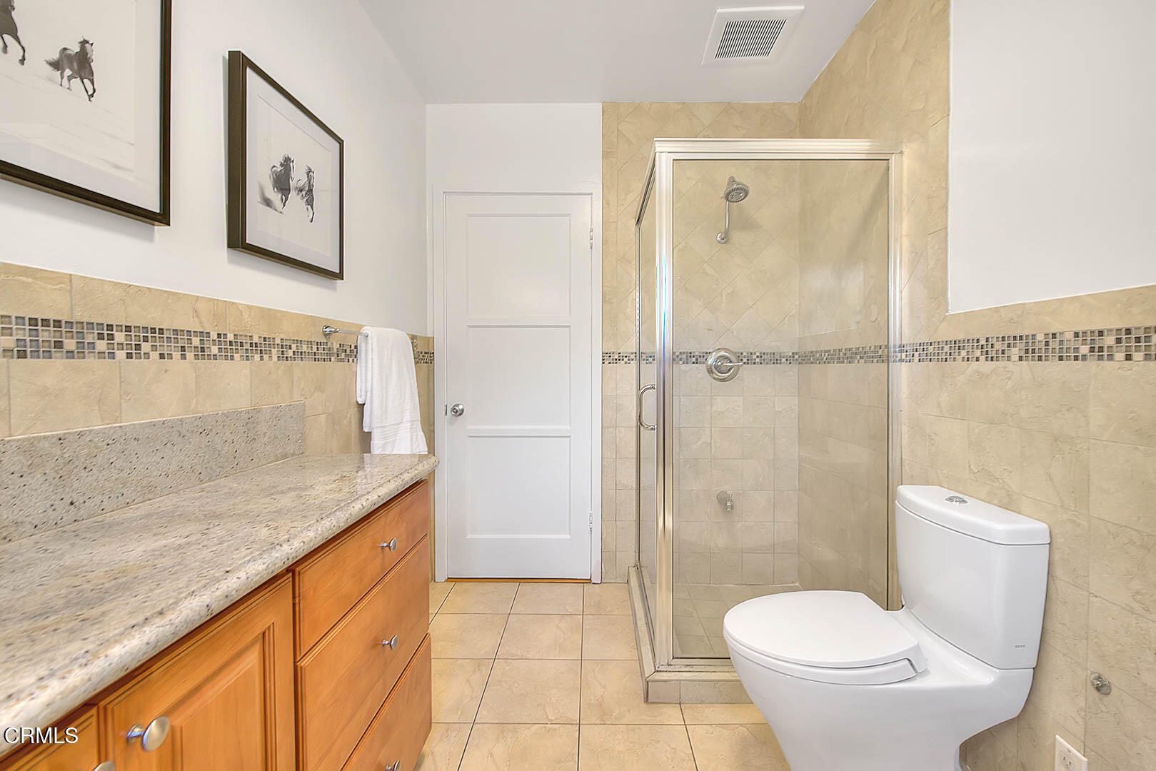 3671 Grayburn Road Pasadena, CA 91107 - Photo 25 of 50 a bathroom with a granite countertop sink a toilet and shower