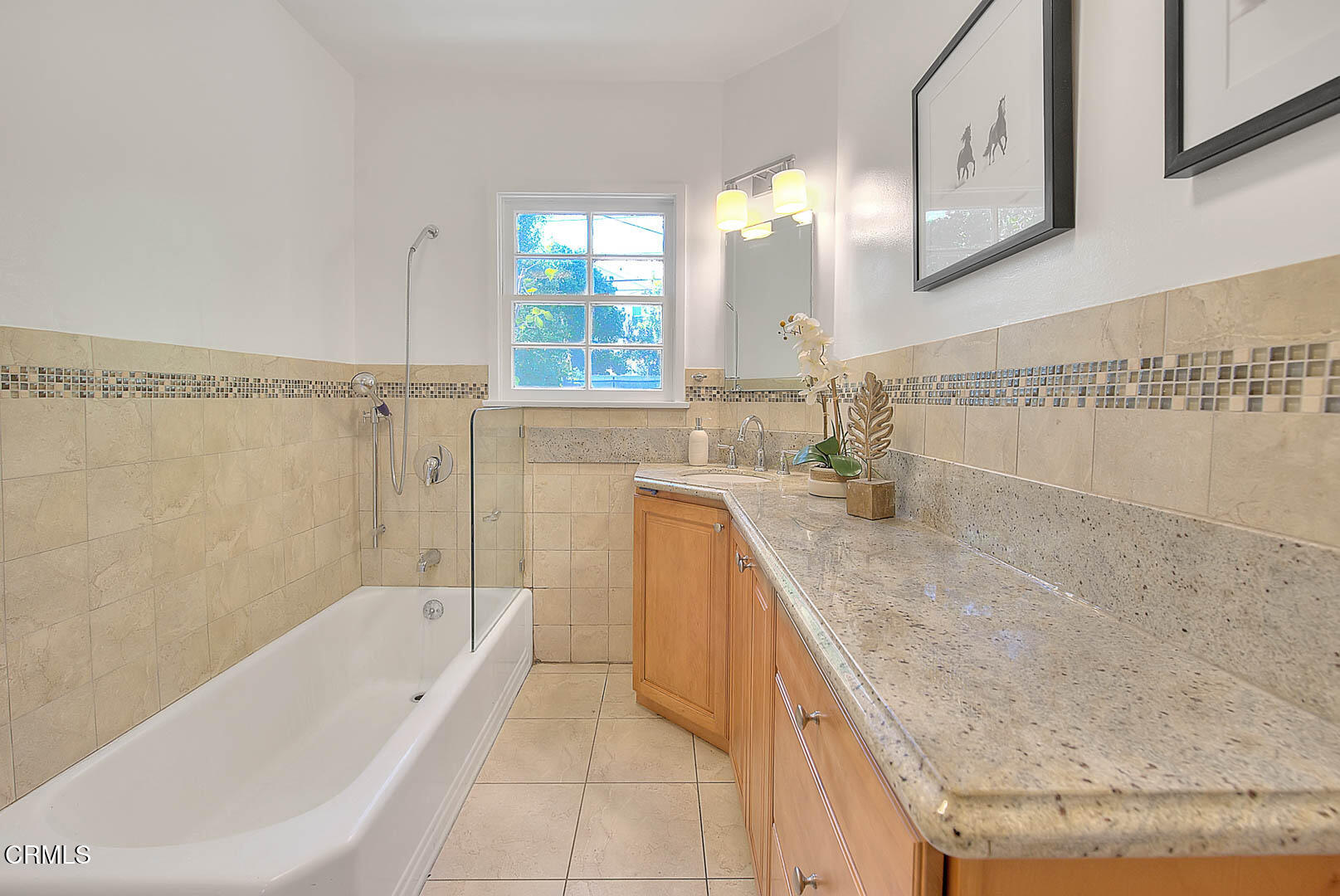 3671 Grayburn Road Pasadena, CA 91107 - Photo 27 of 50 a bathroom with a granite countertop bathtub a sink and a shower