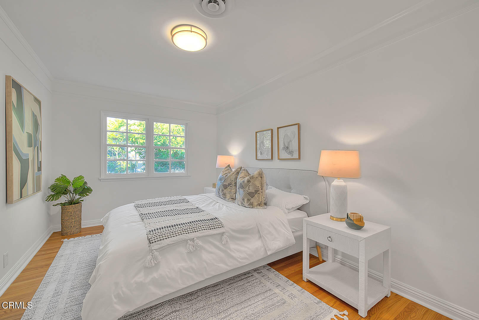 3671 Grayburn Road Pasadena, CA 91107 - Photo 28 of 50 a bedroom with a bed and window