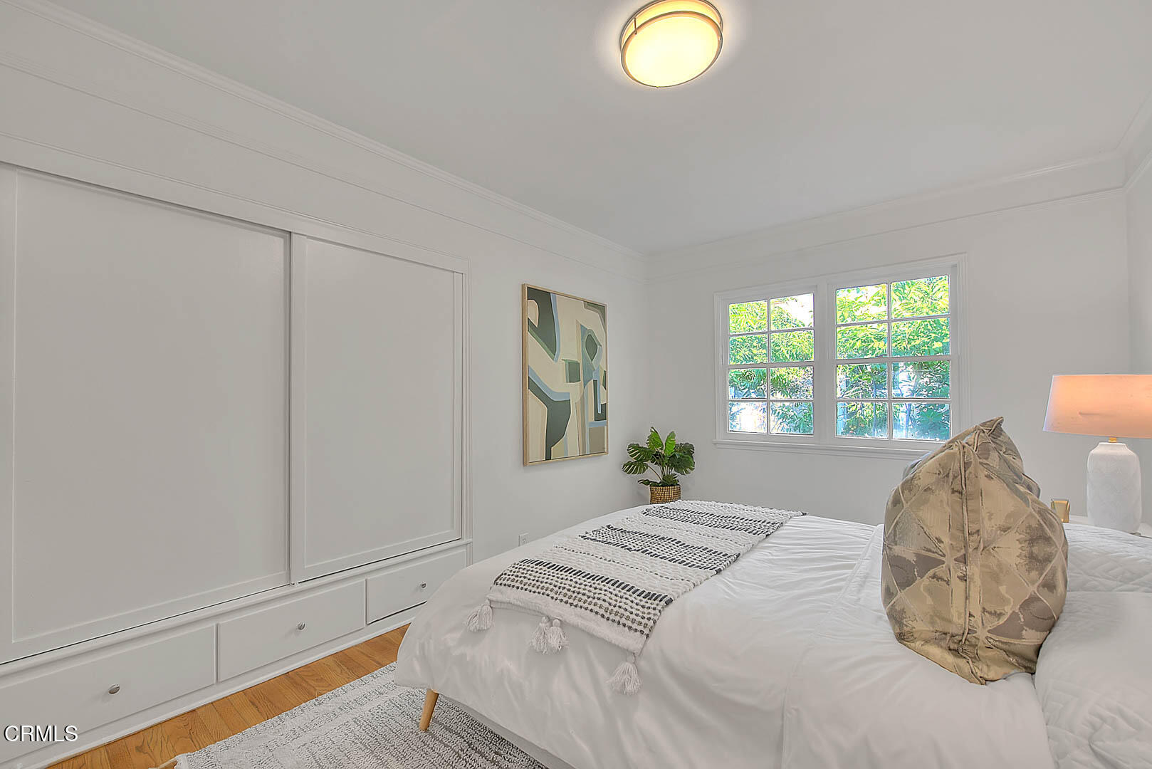 3671 Grayburn Road Pasadena, CA 91107 - Photo 29 of 50 a bedroom with a bed and window