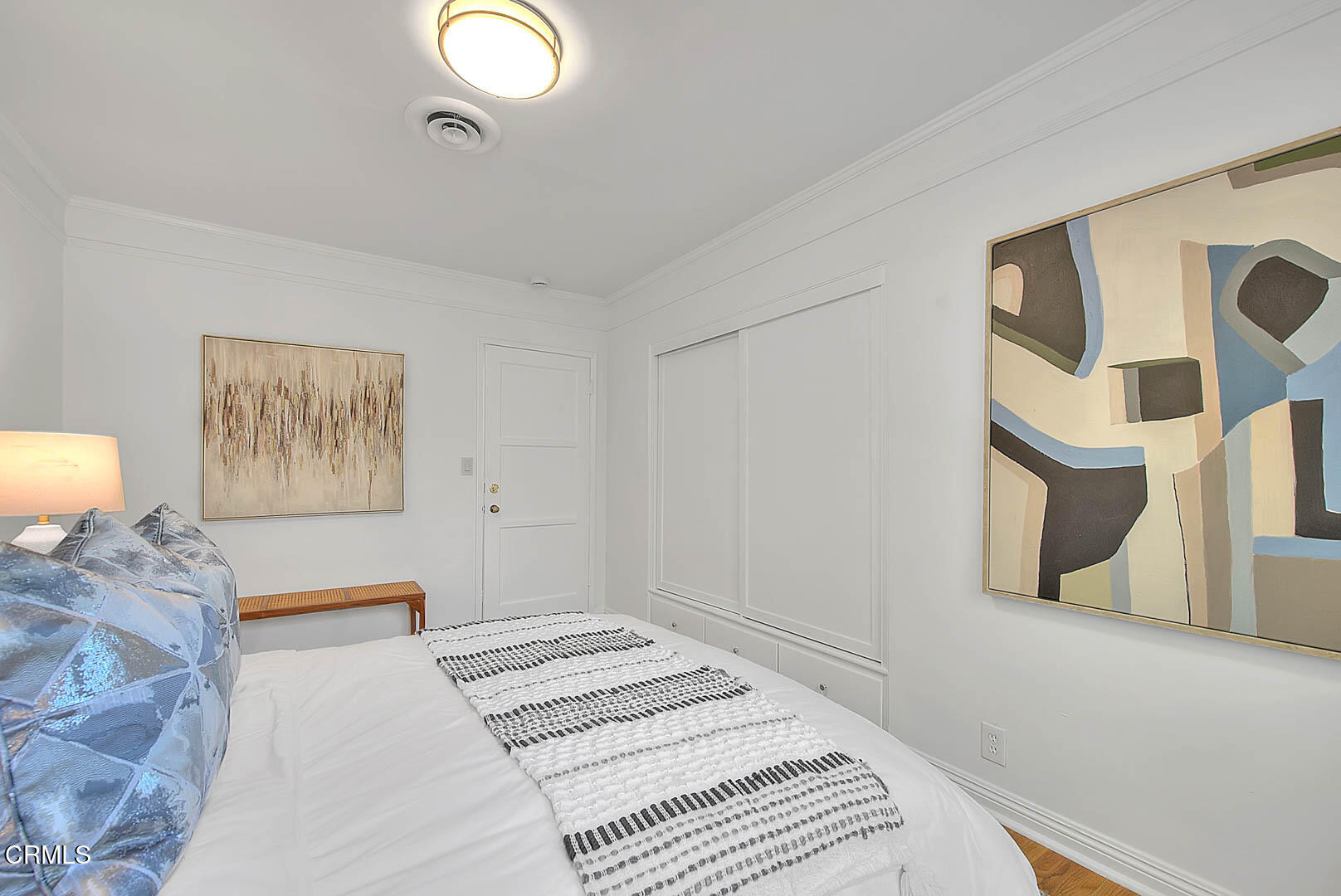 3671 Grayburn Road Pasadena, CA 91107 - Photo 30 of 50 a bedroom with a bed and a painting on the wall