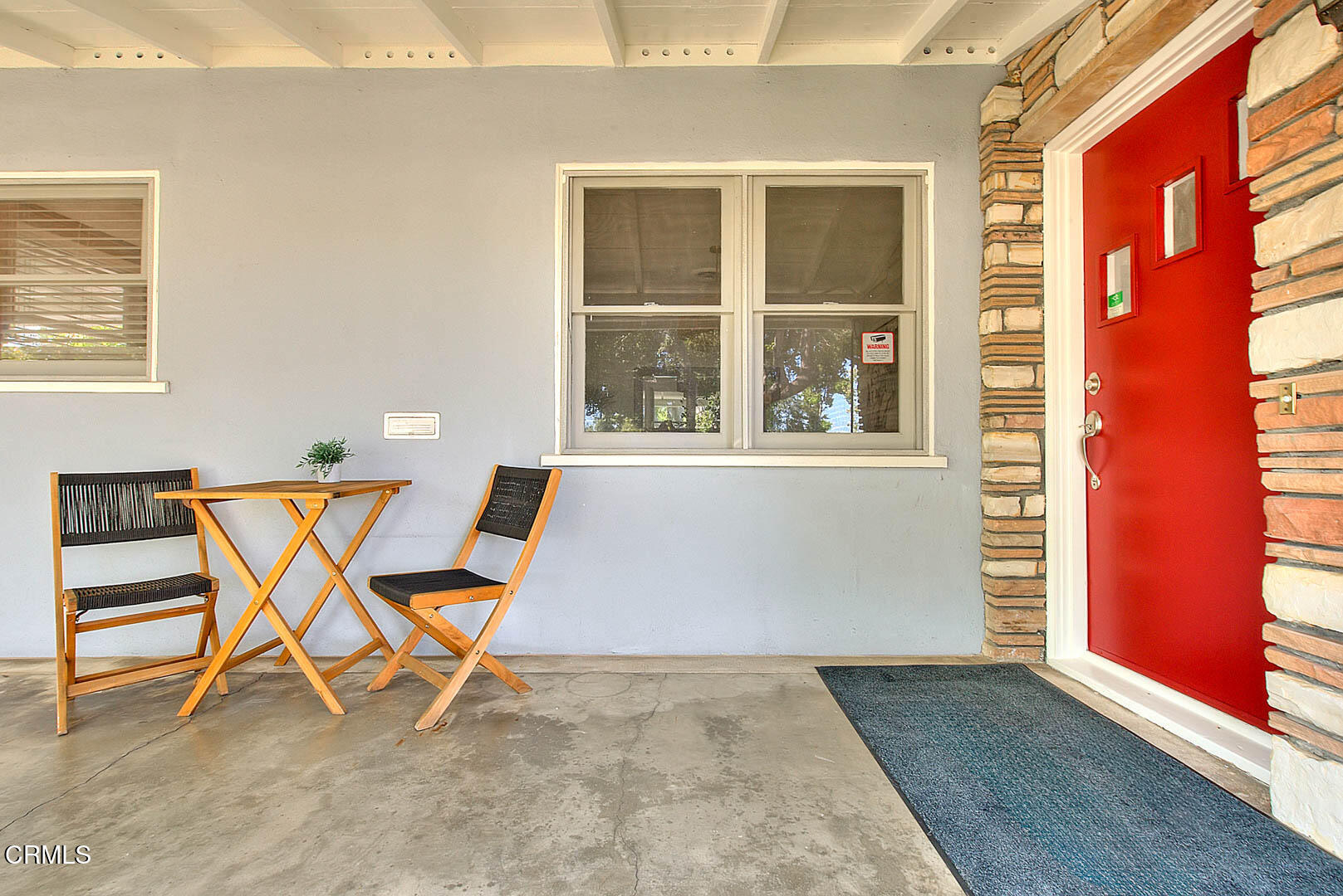 3671 Grayburn Road Pasadena, CA 91107 - Photo 4 of 50 a room that has a wooden table and chairs in it