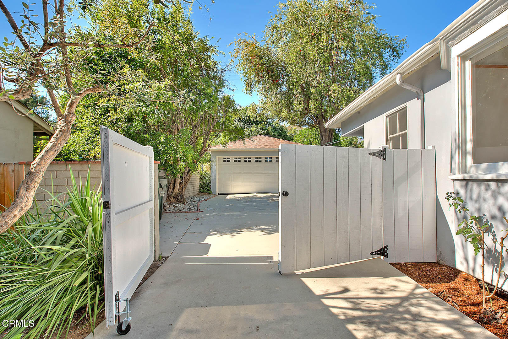 3671 Grayburn Road Pasadena, CA 91107 - Photo 47 of 50 a view of backyard with a barn and a cactus plant