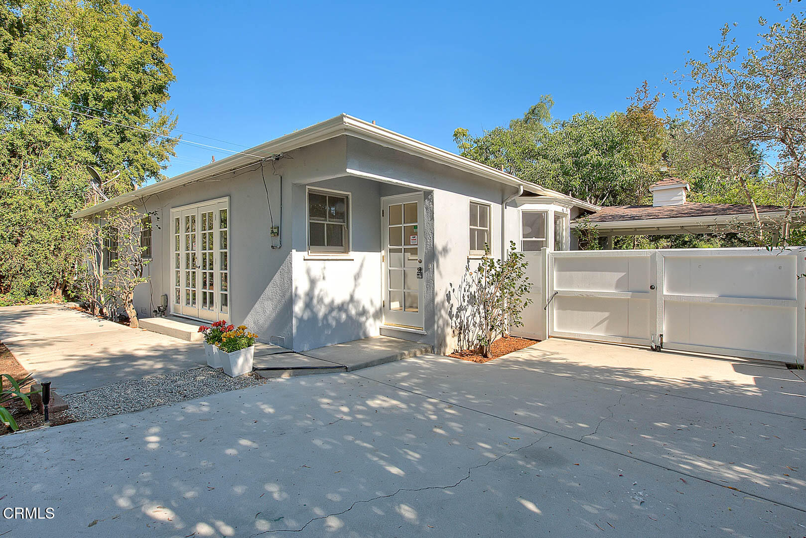 3671 Grayburn Road Pasadena, CA 91107 - Photo 48 of 50 a view of a house with backyard and a tree
