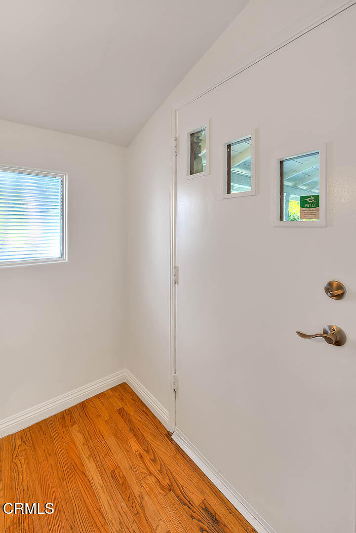 3671 Grayburn Road Pasadena, CA 91107 - Photo 5 of 50 a view of a room with wooden floor and cabinet