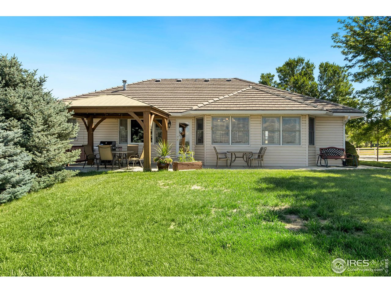 7848 Windsong Road Windsor, CO 80550 - Photo 23 of 37 Back of home