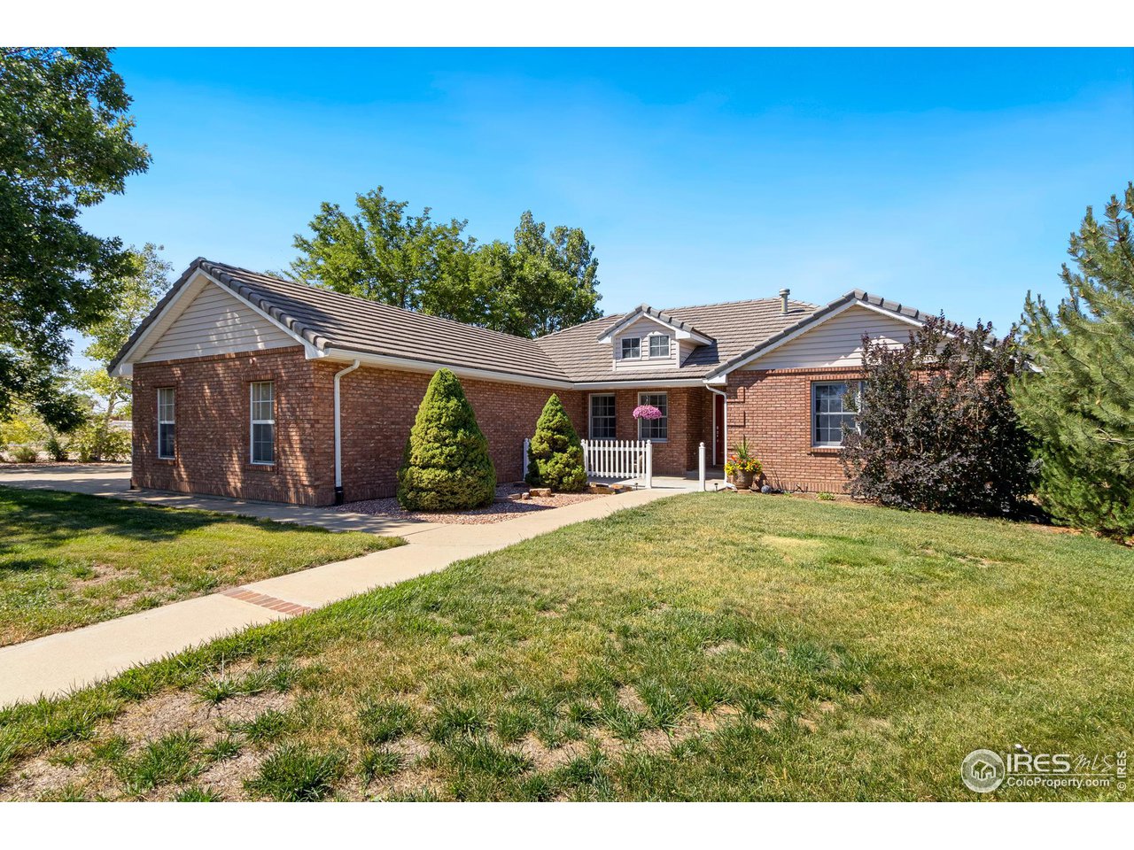 7848 Windsong Road Windsor, CO 80550 - Photo 3 of 37 Beautiful Ranch Home