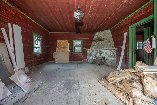 a view of a livingroom with furniture and window