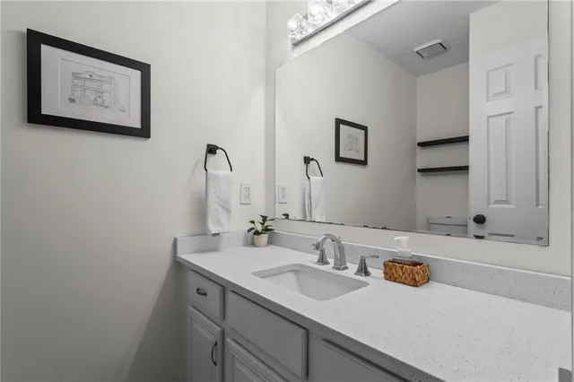 a bathroom with a sink and a bathtub
