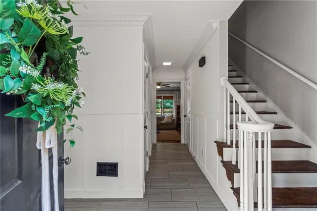 a view of entryway with wooden floor