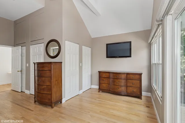a view of room with wooden floor and window