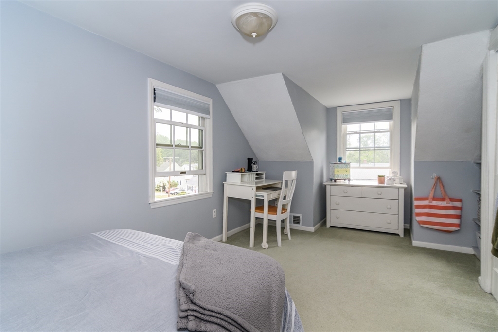 50 Felch Road Natick, MA 01760 - Photo 19 of 32 a bedroom with furniture and a window