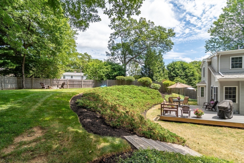 50 Felch Road Natick, MA 01760 - Photo 29 of 32 a view of a house with a yard porch and furniture