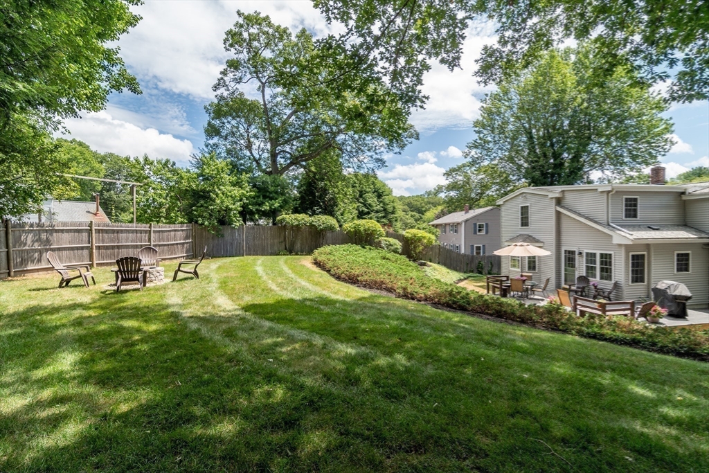 50 Felch Road Natick, MA 01760 - Photo 31 of 32 a front view of a house with garden