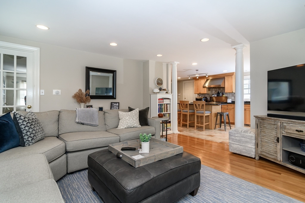50 Felch Road Natick, MA 01760 - Photo 8 of 32 a living room with fireplace furniture and a flat screen tv