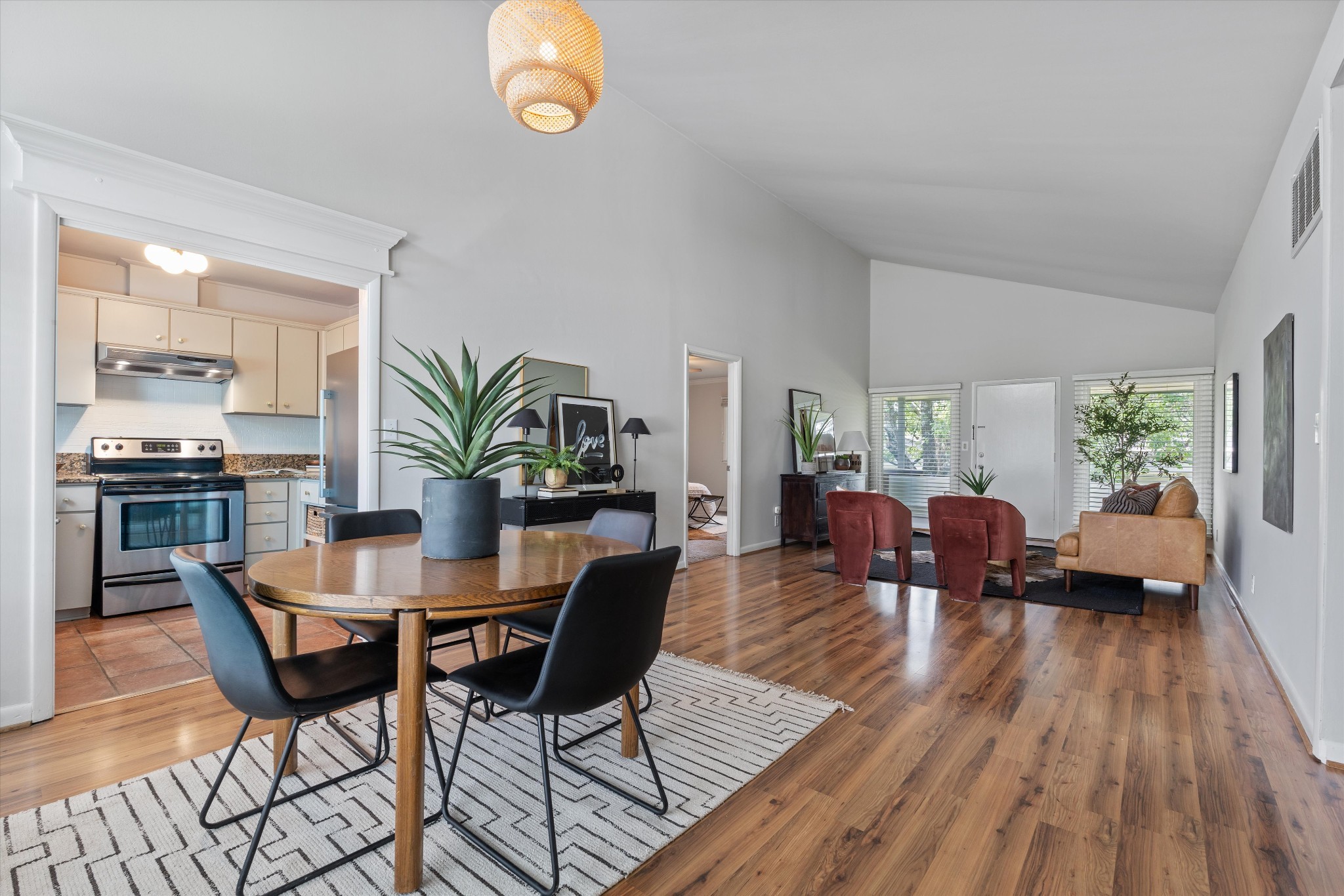 1900 Richard Jones Road, Unit P2 Nashville, TN 37215 - Photo 1 of 20 a view of a dining room with furniture and wooden floor