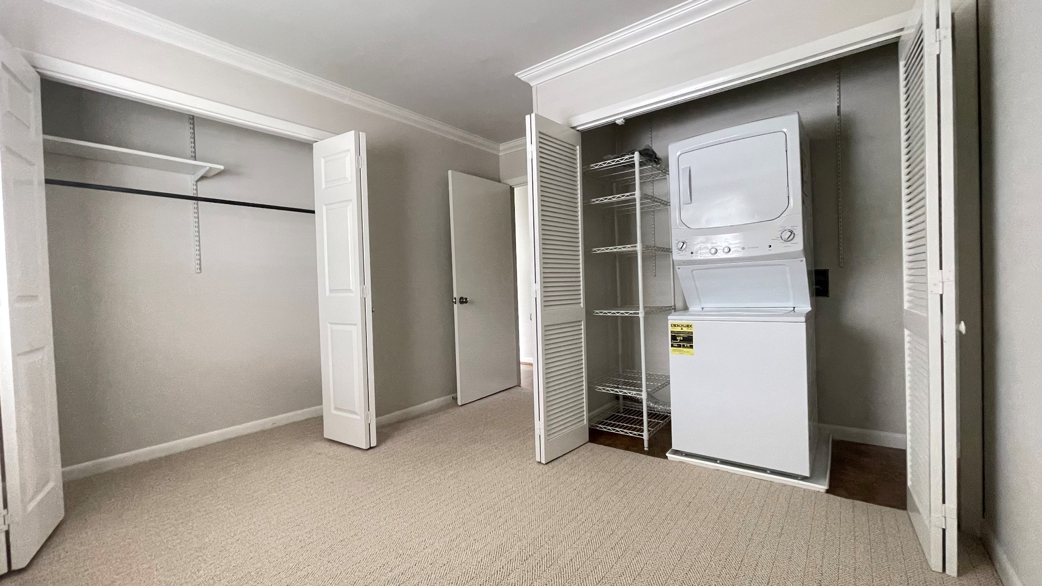 1900 Richard Jones Road, Unit P2 Nashville, TN 37215 - Photo 14 of 20 a view of an empty room with closet and a window