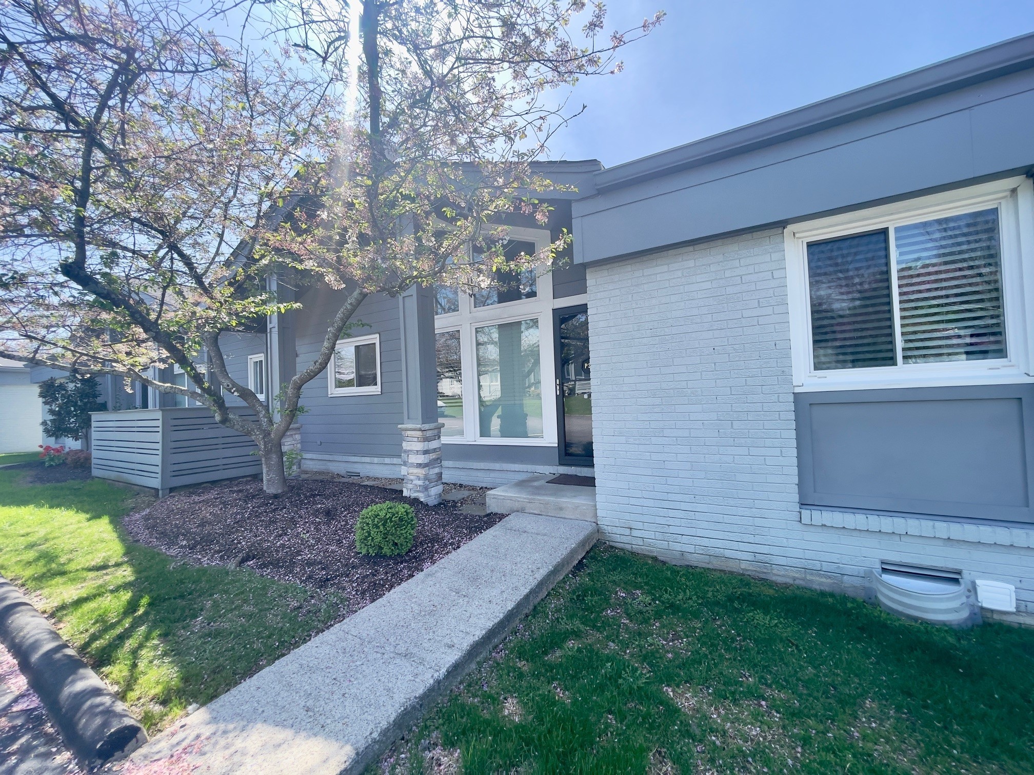 1900 Richard Jones Road, Unit P2 Nashville, TN 37215 - Photo 3 of 20 a view of a house with a yard