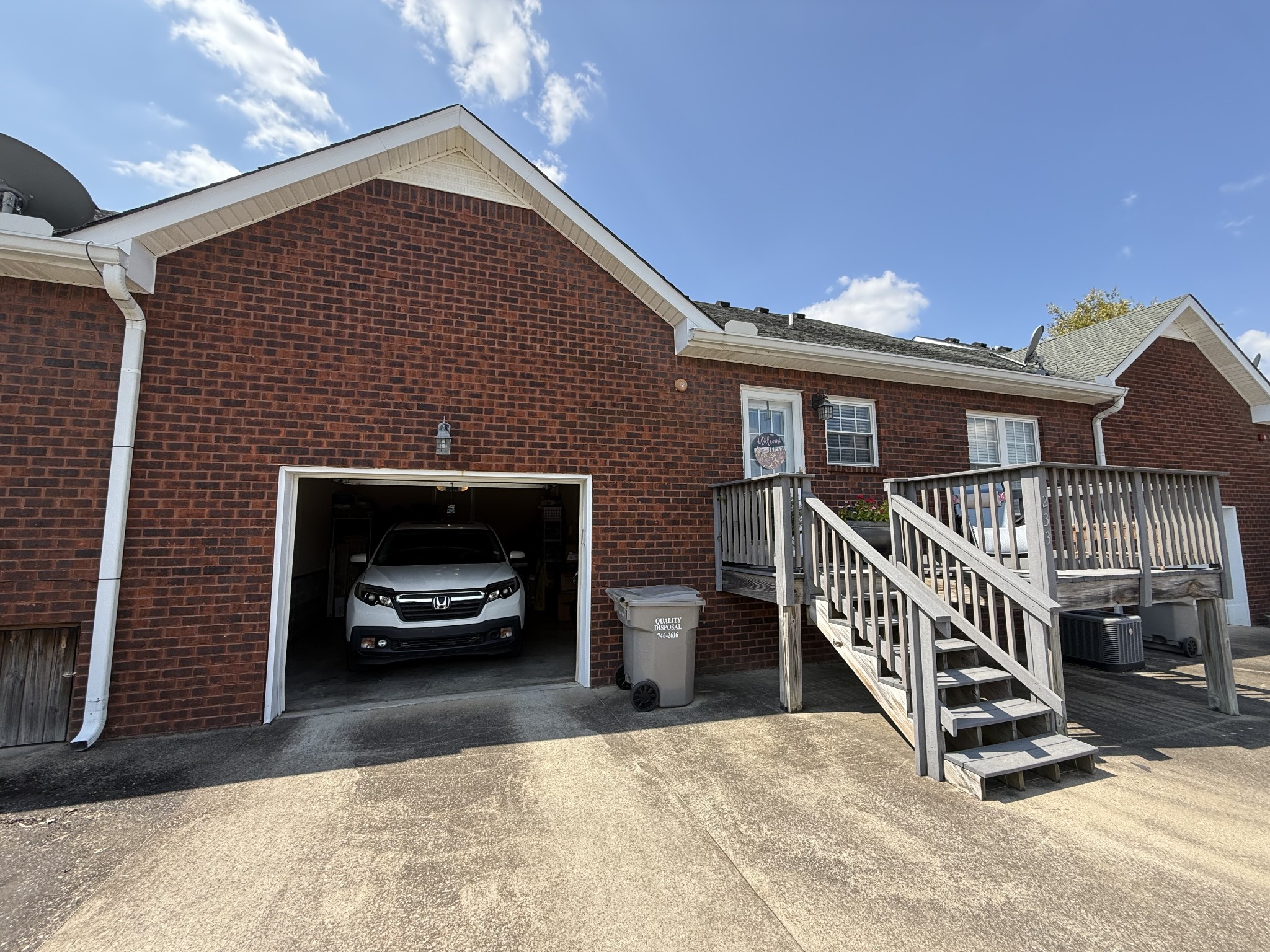 233 Winfrey Court Pleasant View, TN 37146 - Photo 26 of 28 a view of a house with a deck