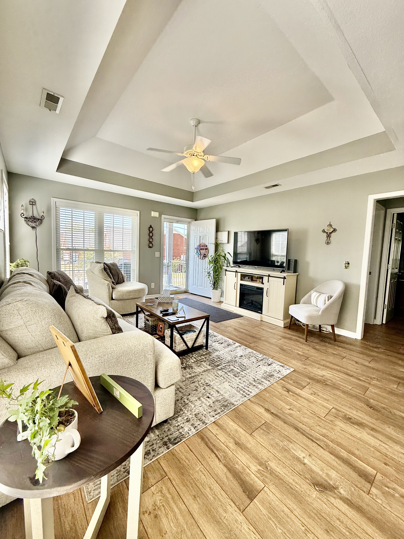 233 Winfrey Court Pleasant View, TN 37146 - Photo 7 of 28 a living room with furniture fireplace and a flat screen tv