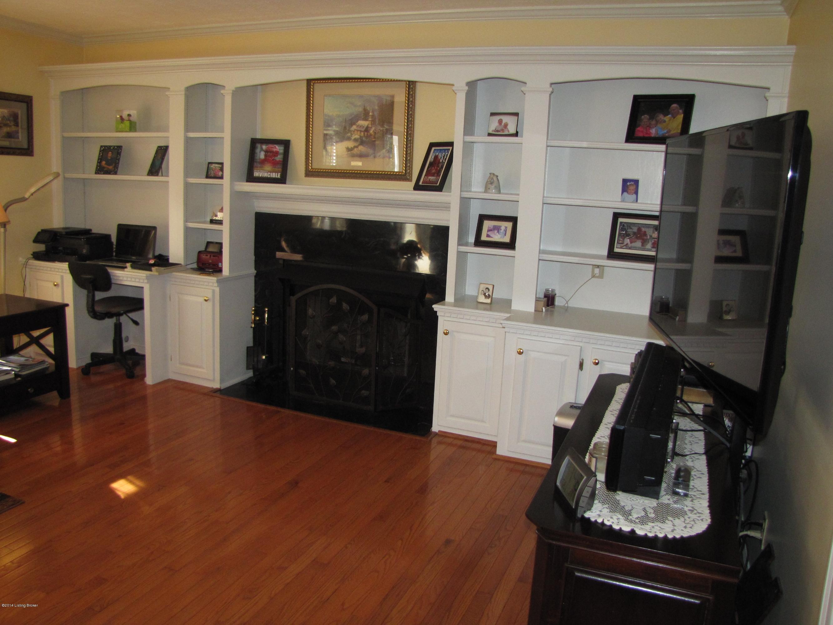 218 Fox Run Road Pendleton, KY 40055 - Photo 6 of 54 Living room is completed with custom built in cabinetry, which includes a desk nook, perfect for working from home or children’s school projects.