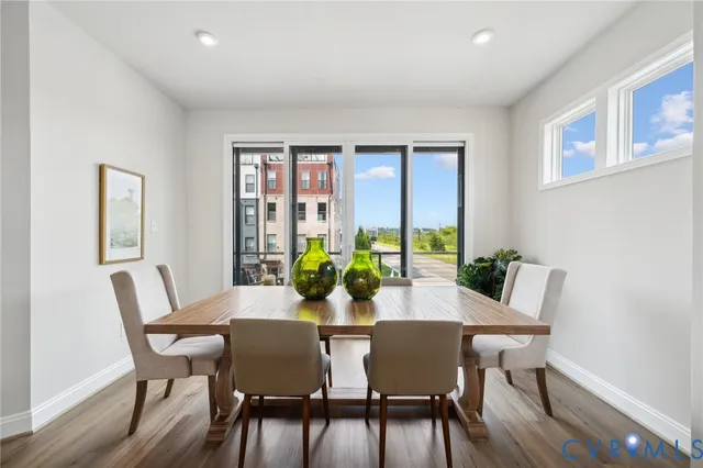 a view of city from balcony with seating space