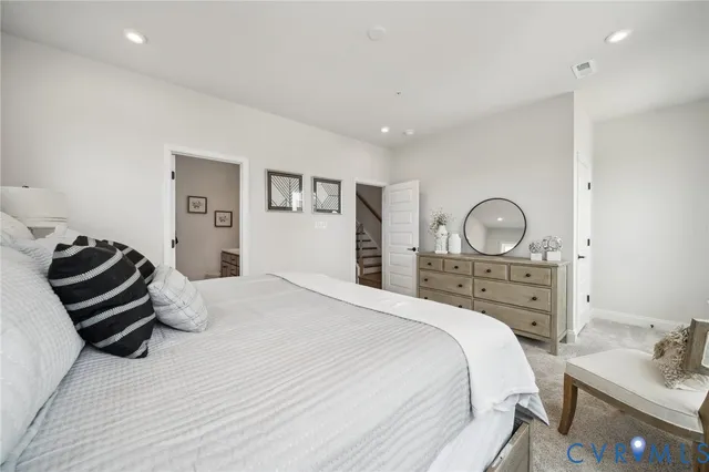 a bathroom with a shower and a sink