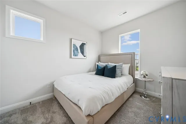 a view of entryway with stairs and wooden floor
