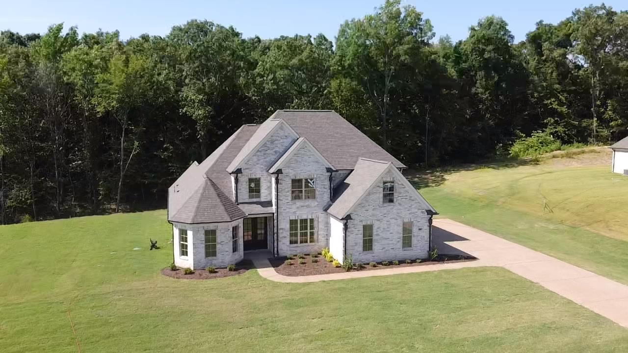 80 Fairview Trail Byhalia, MS 38611 - Photo 24 of 25 a aerial view of a house next to a big yard and large trees
