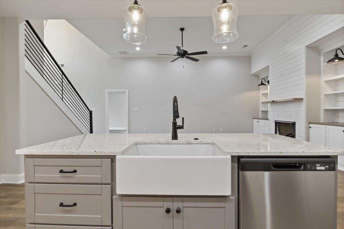 80 Fairview Trail Byhalia, MS 38611 - Photo 7 of 25 a kitchen with a sink a stove and a refrigerator