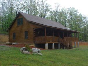 1235 Villamont Church Road Blue Ridge, VA 24064 - Photo 1 of 8 a front view of house with a garden