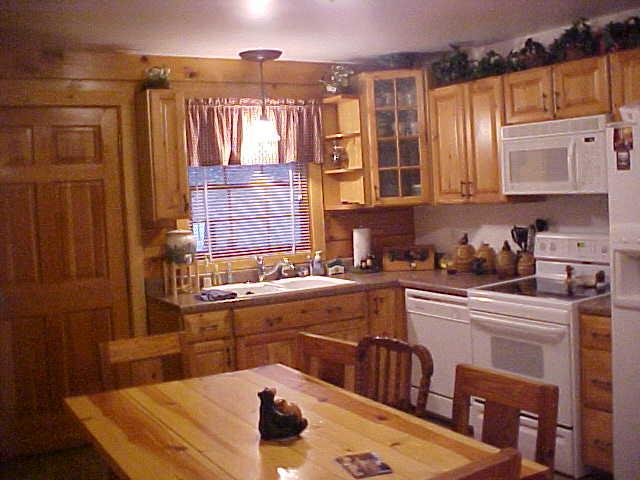 1235 Villamont Church Road Blue Ridge, VA 24064 - Photo 3 of 8 a kitchen with a sink and cabinets