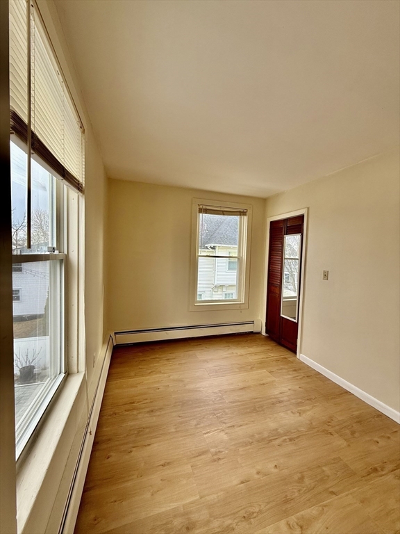 17 Maple Street, Unit 2 Braintree, MA 02184 - Photo 14 of 25 a view of an empty room and window