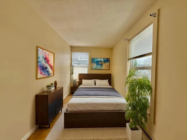 a bathroom with a sink toilet a mirror and vanity