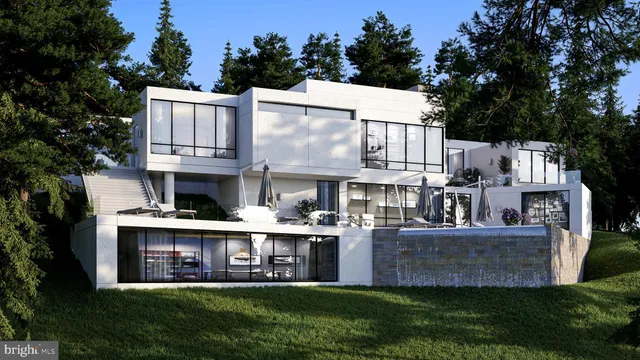 a view of a house with a yard and sitting area