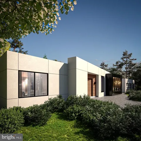 a view of a house with a small yard and floor to ceiling window