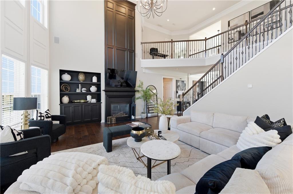 3173 Abbey Place Southwest Atlanta, GA 30331 - Photo 11 of 56 a living room with furniture and a lamp