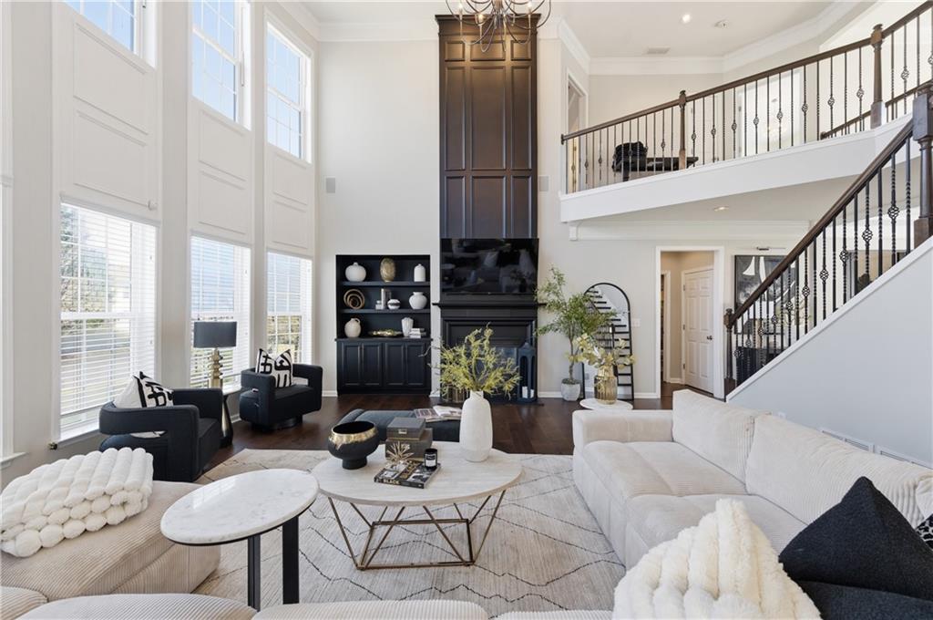 3173 Abbey Place Southwest Atlanta, GA 30331 - Photo 12 of 56 a living room with furniture fireplace and a large window