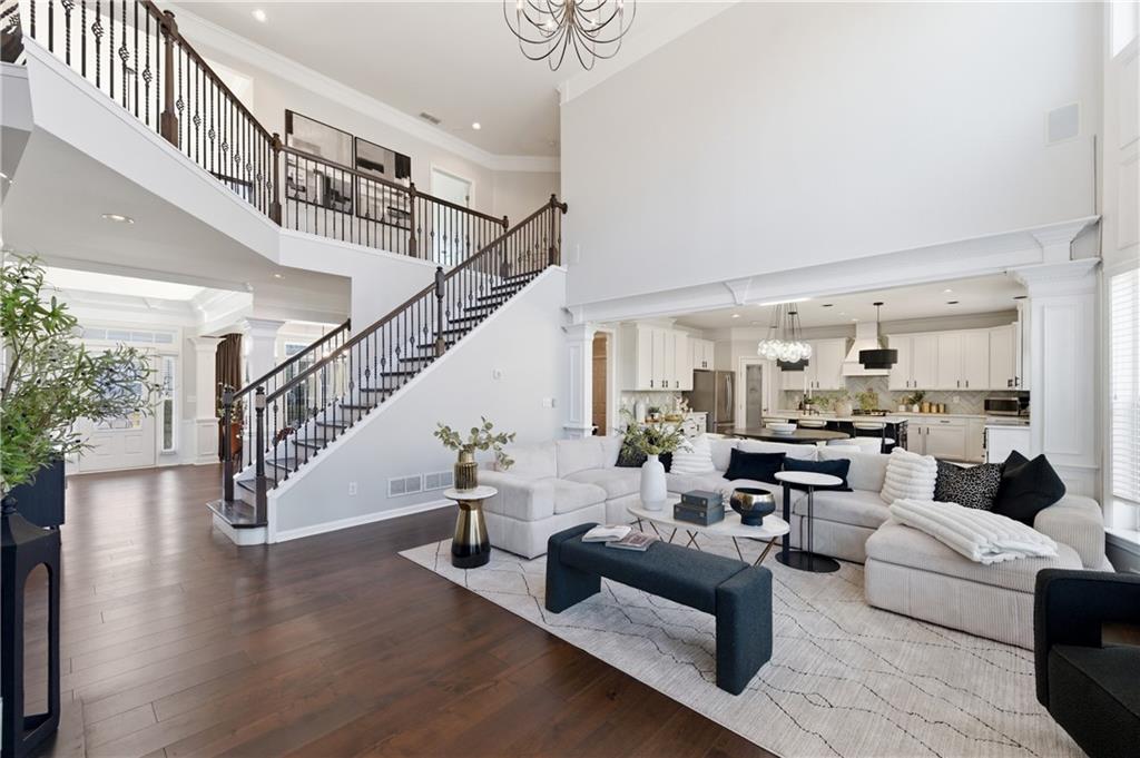 3173 Abbey Place Southwest Atlanta, GA 30331 - Photo 13 of 56 a living room with furniture and stairs