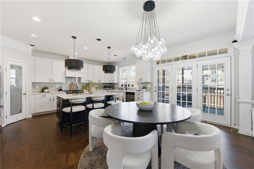 3173 Abbey Place Southwest Atlanta, GA 30331 - Photo 21 of 56 a view of a dining room with furniture and wooden floor