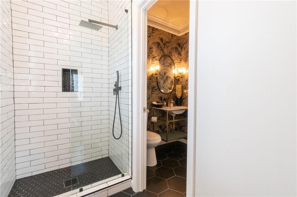 3173 Abbey Place Southwest Atlanta, GA 30331 - Photo 23 of 56 a bathroom with a shower