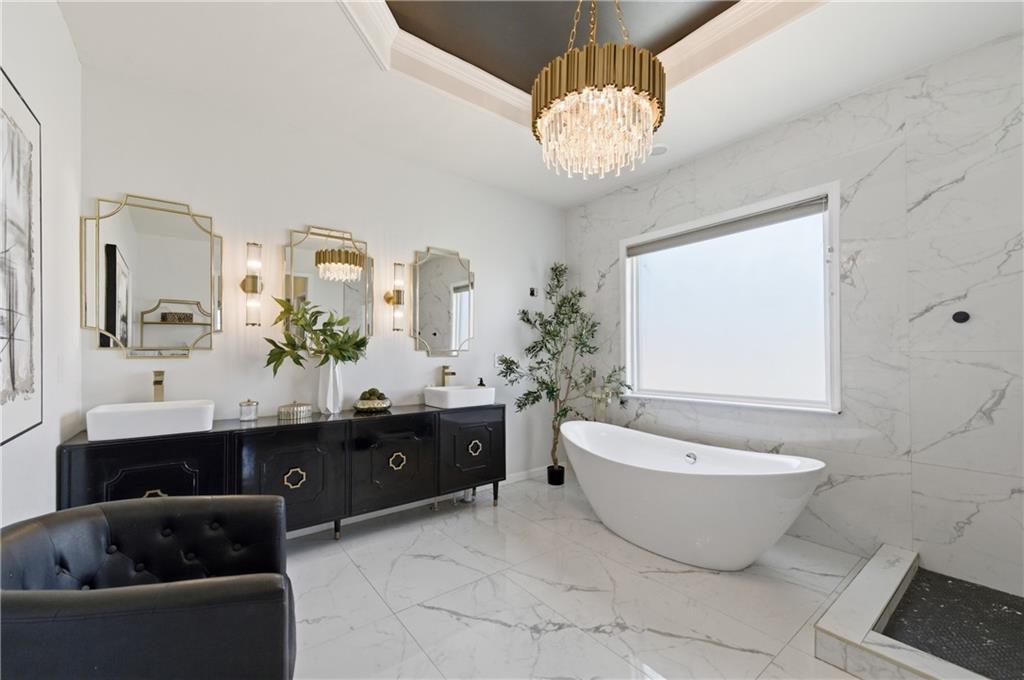 3173 Abbey Place Southwest Atlanta, GA 30331 - Photo 31 of 56 a spacious bathroom with a bathtub and a sink