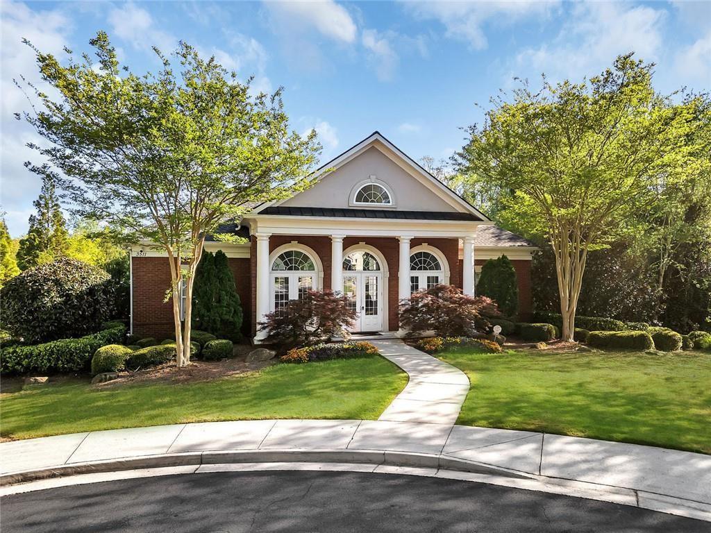 3173 Abbey Place Southwest Atlanta, GA 30331 - Photo 53 of 56 a front view of a house with garden