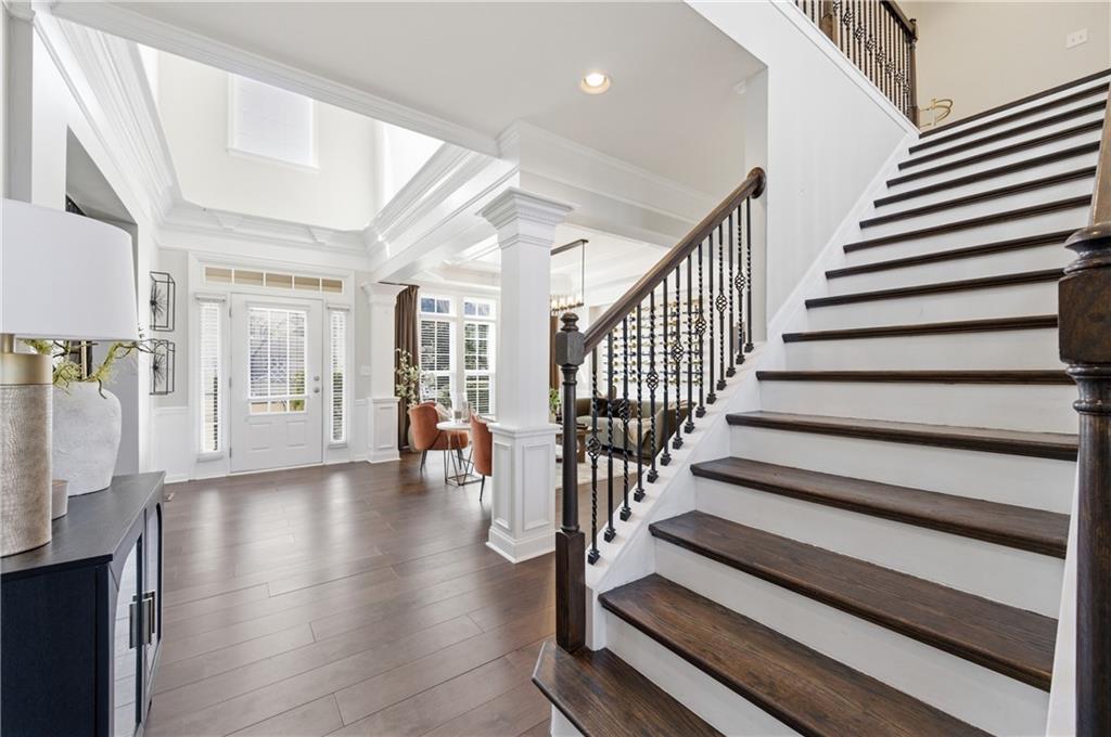 3173 Abbey Place Southwest Atlanta, GA 30331 - Photo 8 of 56 a view of staircase with lots of frames on wall and a window